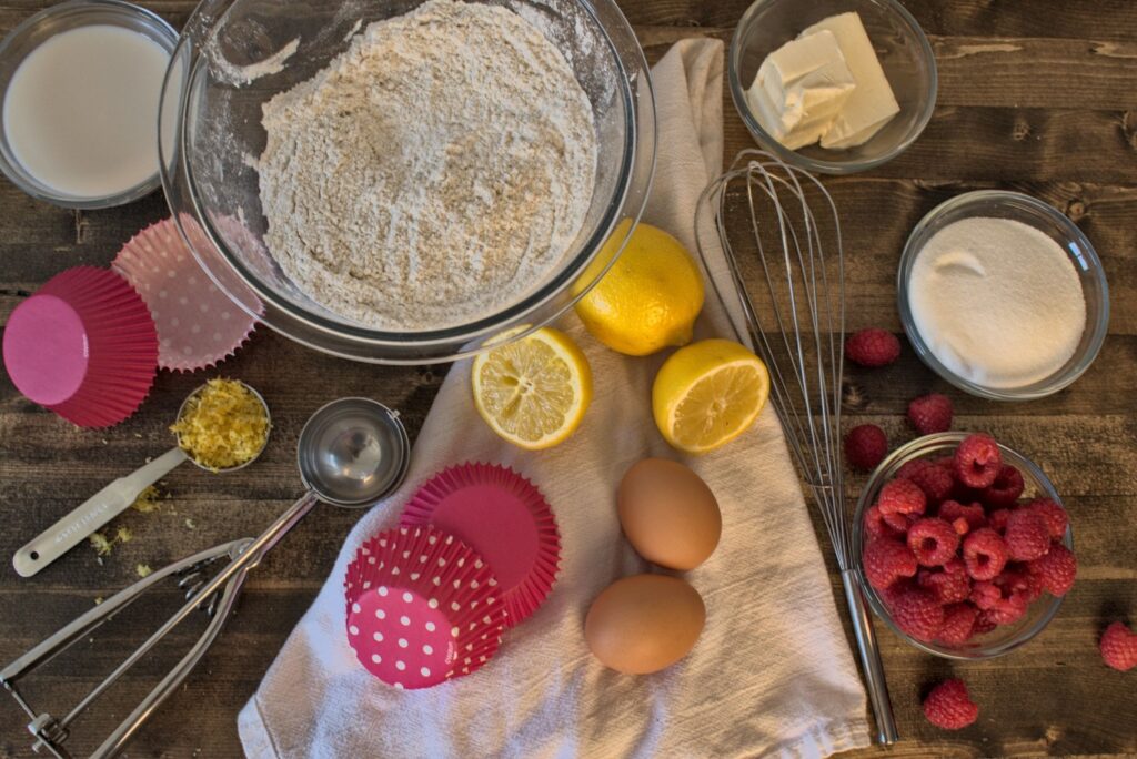 ingredients for lemon cupcakes with raspberry filling