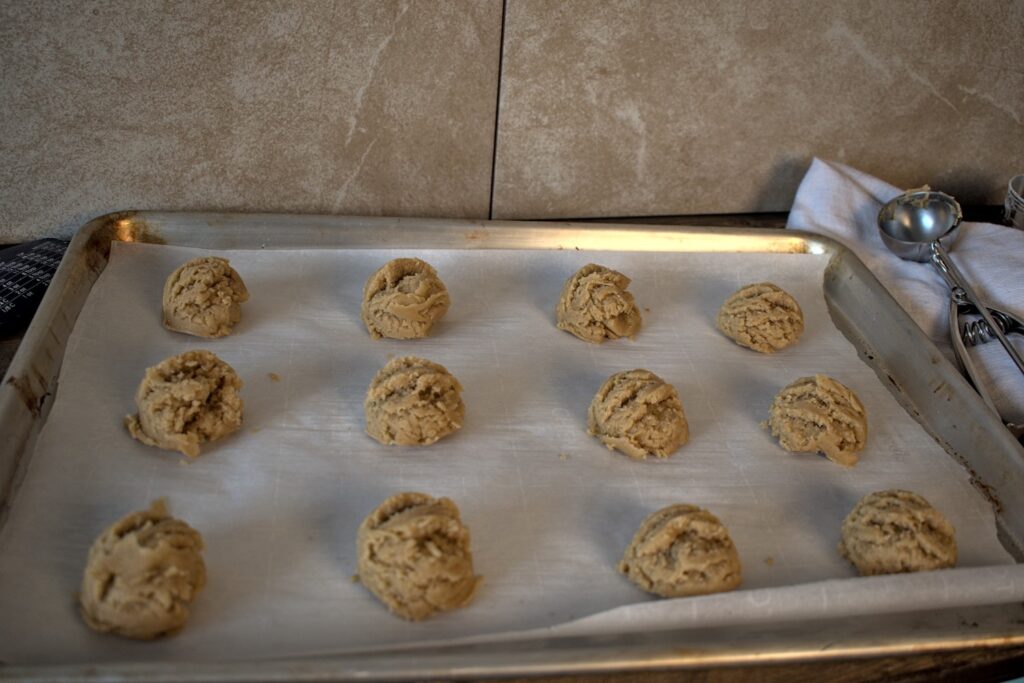 peanut butter cookie dough on baking tray